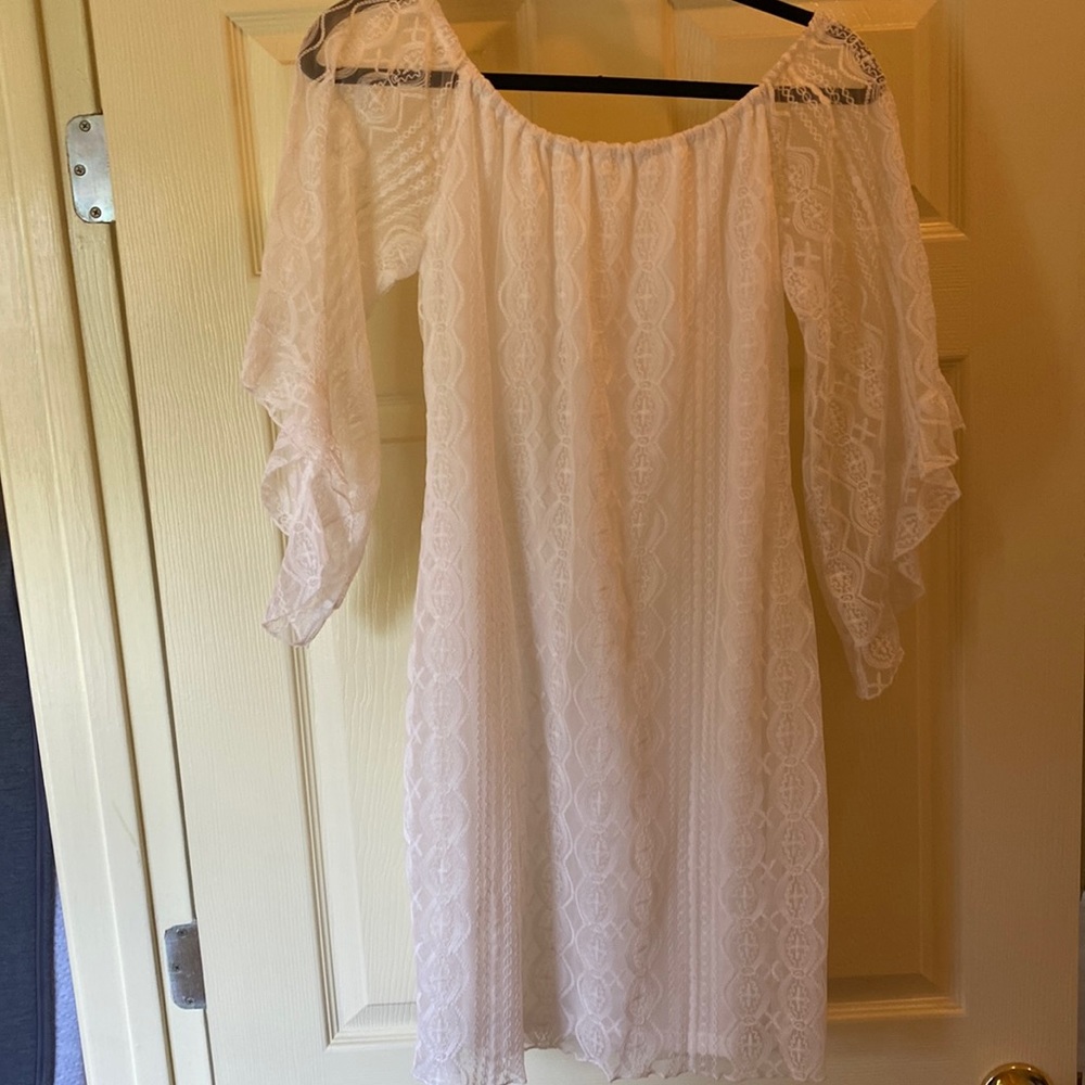 CC Mini dress size small in great shape. Sheer in arms and a slip in the body.